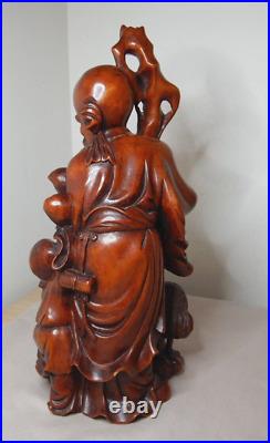 ANTIQUE CHINESE FINELY CARVED WOOD STATUETTE WITH GLASS EYES 30cm HIGH SIGNED