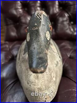 Antique Hand carved wood duck decoys. Lead weights are original. Glass Eyes