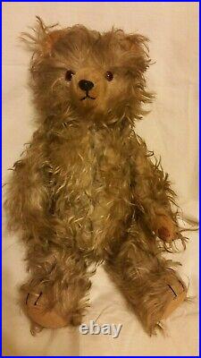 Antique Wood stuffed Glass eyes Long pointed snout Gold Mohair Disc jointed Bear