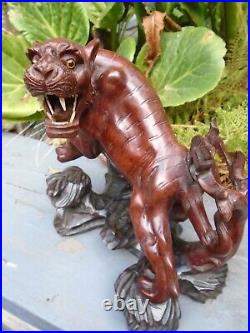 Japanese Antique wood carved tiger statue on wood base and glass eyes