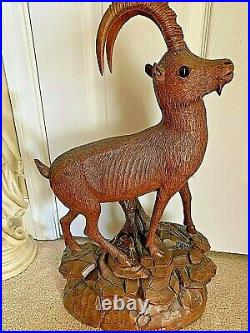 PAIR Antique Wood Sculpture Black Forest. Ibex Pair. Each 23 H. Glass eyes