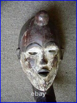 Vintage Punu mask, Gabon, Africa, wood and pigments, glass eyes