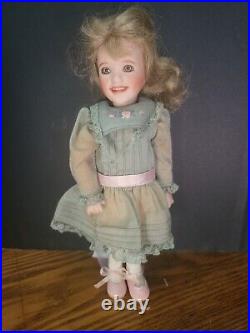 Wendy Lawton 8 1/2 Bisque and Wood Doll with Glass Eyes