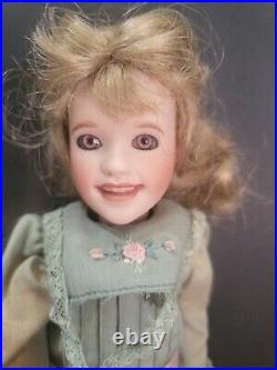 Wendy Lawton 8 1/2 Bisque and Wood Doll with Glass Eyes